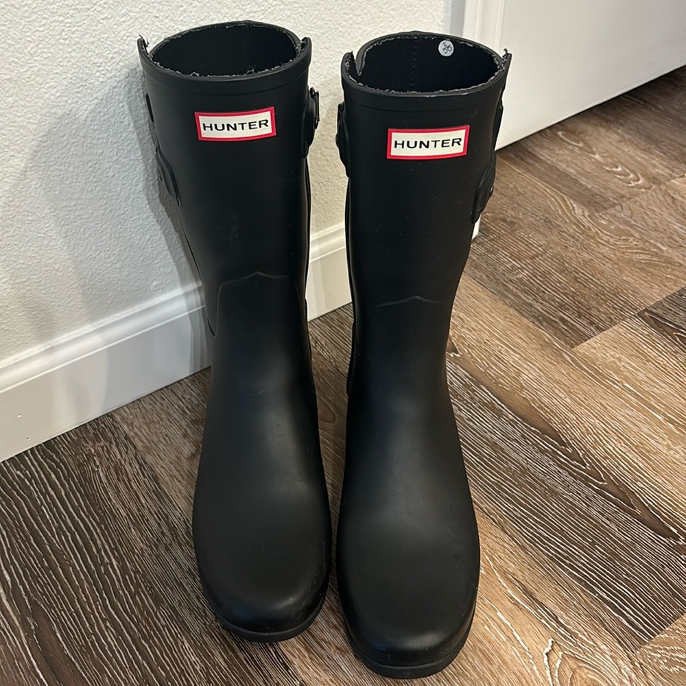 Refined tall hunter boots.